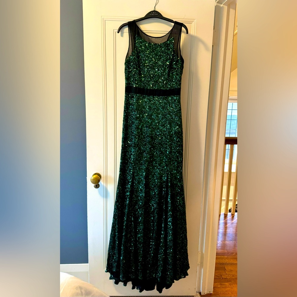 Long green sequin dress V detail in the back. Great dress for formal occasion